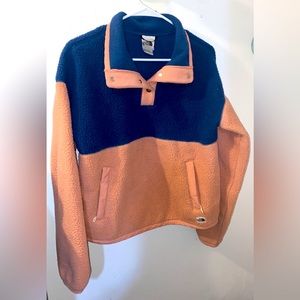 Women’s light pink and blue sweater button up neck North Face